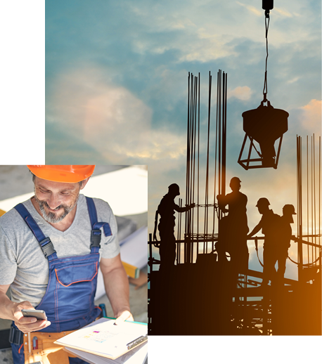 Engineer smiling at clipboard and mobile phone and a construction site
